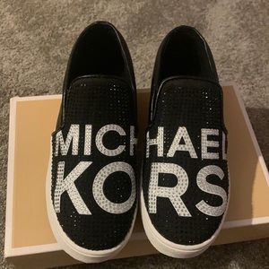 Brand New Pair Of Michael Kors Kids Shoes. Black and white, with rhinestones..